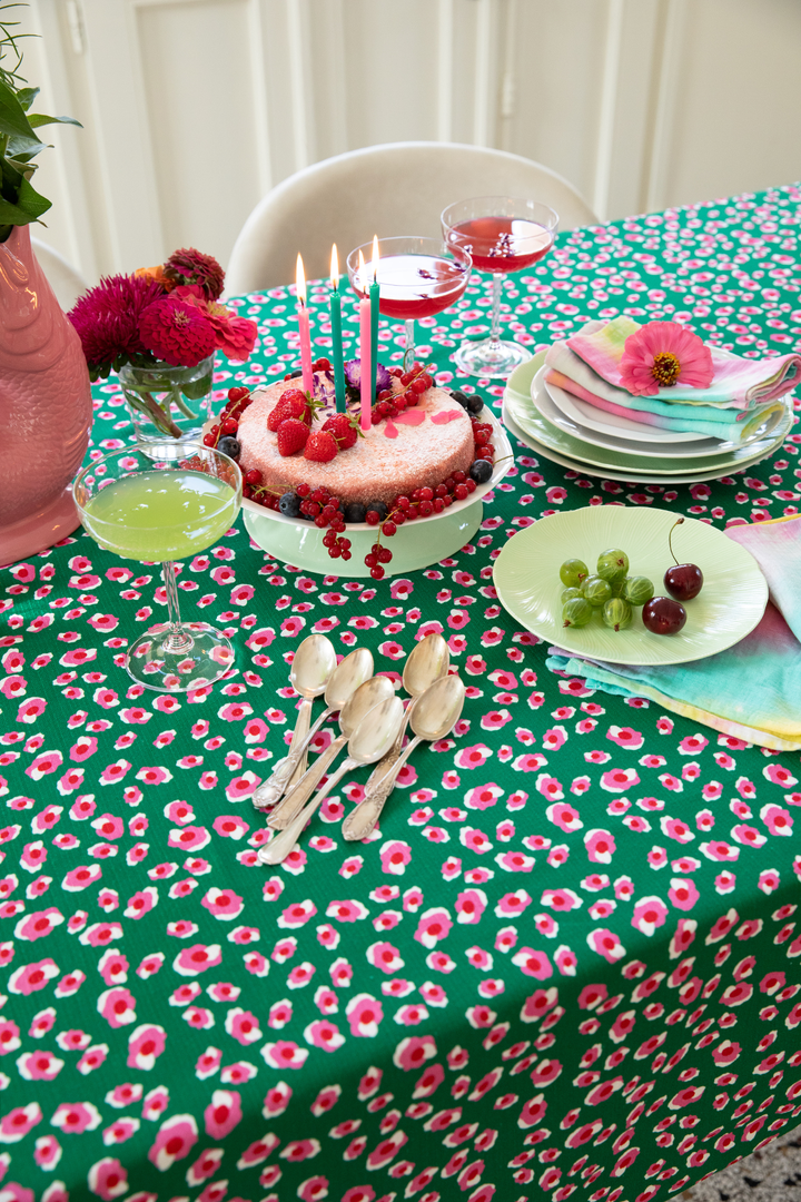 Green, pink, and white leopard print tablecloth