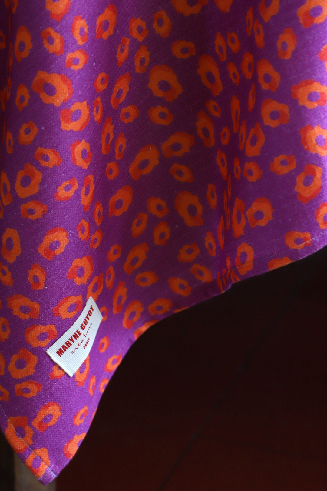 Purple tablecloth with orange pattern - full-bodied cinnamon