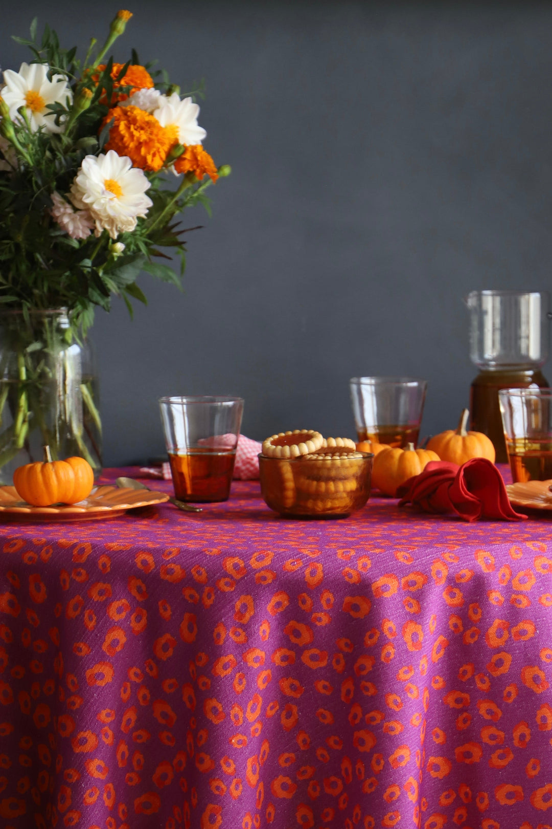 Purple tablecloth with orange pattern - full-bodied cinnamon