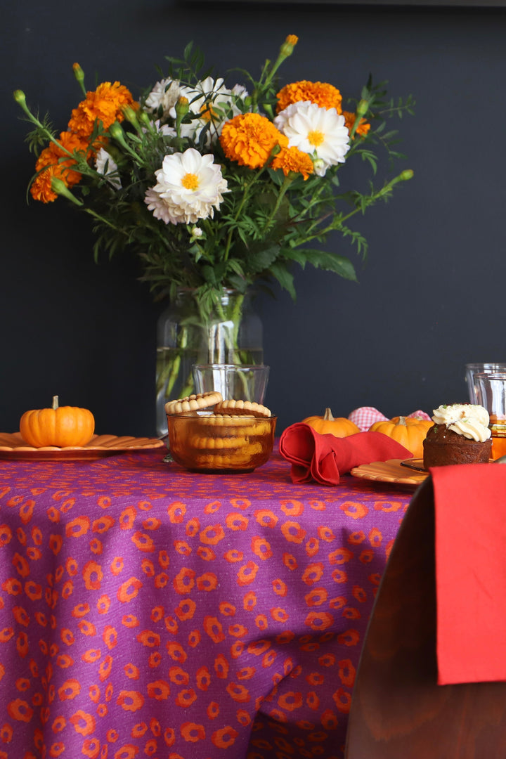 Purple tablecloth with orange pattern - full-bodied cinnamon