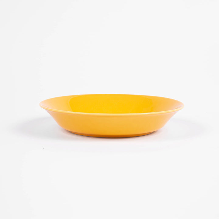 L'assiette creuse ronde en porcelaine - Jaune moutarde Assiettes creuses Ogre la Fabrique